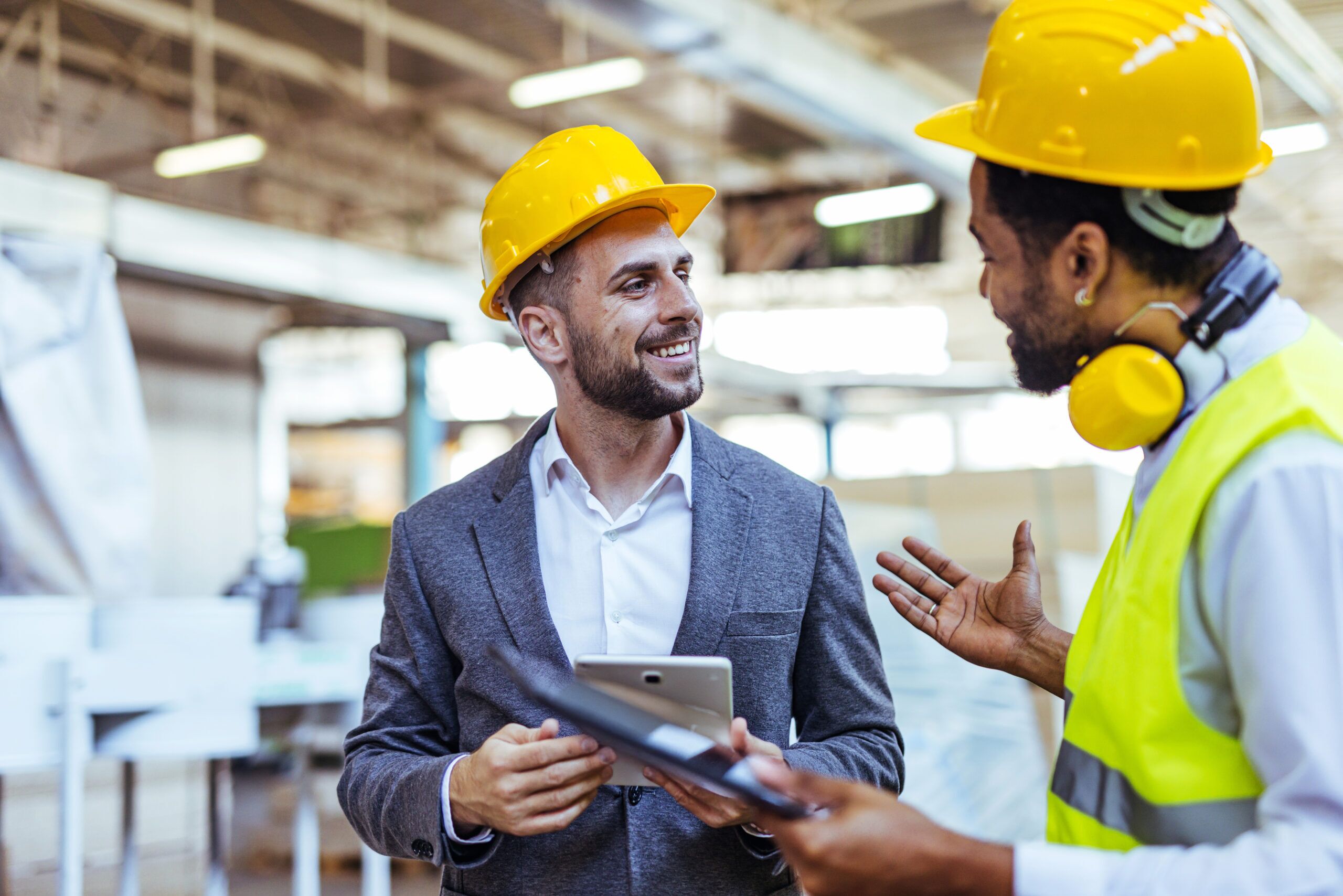 Two employees discussing something while at work