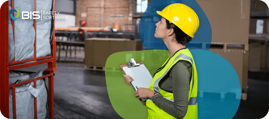 Worker inspecting inventory in a warehouse