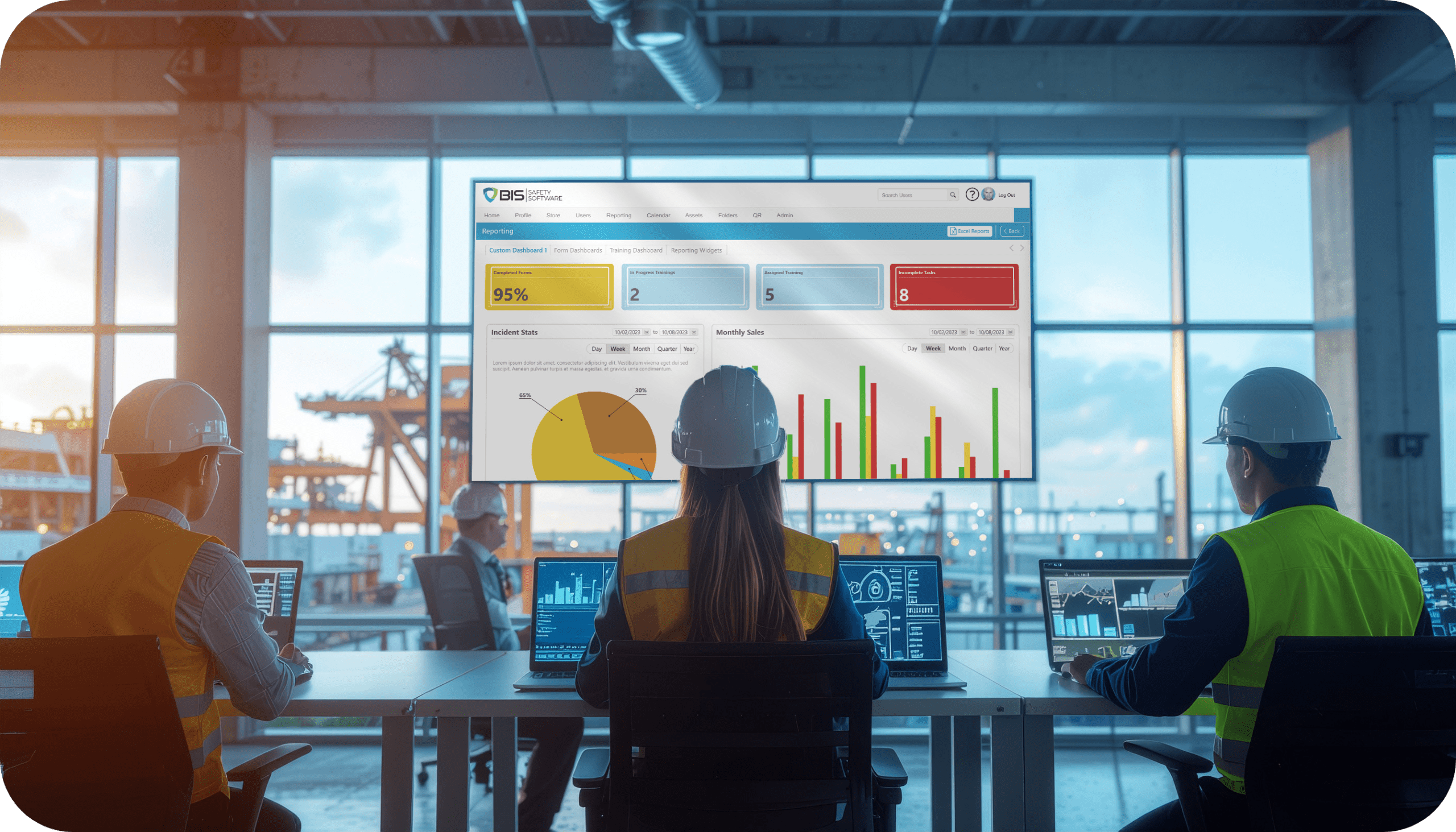 Control-room style meeting with engineers in PPE analyzing real-time EHS metrics on laptops and a central screen.